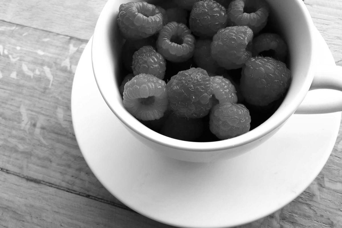 Grayscale still-life photograph on a pale table